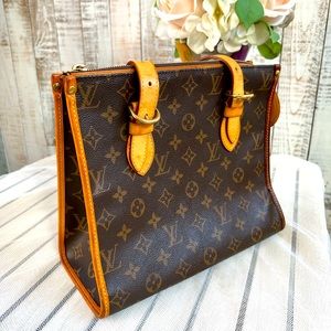 Luxury Louis Vuitton Popincourt Haut monogram handbag.